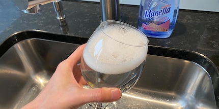 Pre-rinse thoroughly and then fill with detergent and warm water.