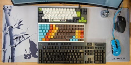 Size comparison of the Miya Pro Panda Edition (65 per cent), my DIY keyboard (75 per cent), and a Logitech G915 (100 per cent).