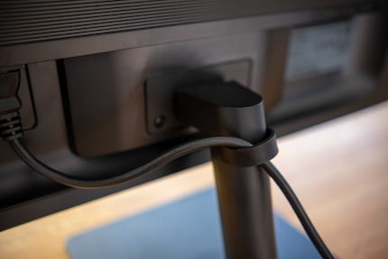 Samsung even thought of a rubber cable management strap.