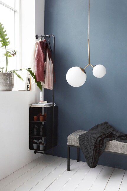 Jackets and other items can be neatly stowed in corners