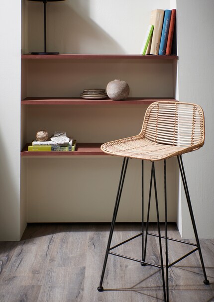 Whether it’s a curated ceramics collection or a library, use shelving to accentuate any alcove, no matter how nondescript. Image: HK Living
