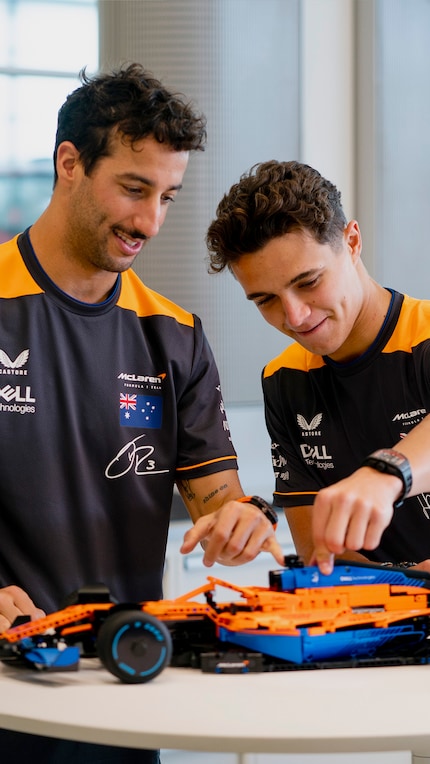 McLaren drivers Daniel Ricciardo and Lando Norris enjoying the Lego model.