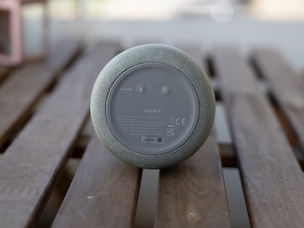 The pairing and timer buttons are on the bottom of the speaker.