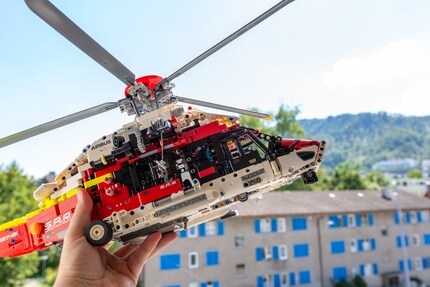 With the front landing gear folded, the helicopter sets off for its next rescue mission.