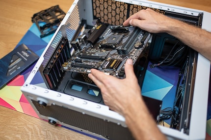 The first thing I do is insert the motherboard into the case – a rookie error.