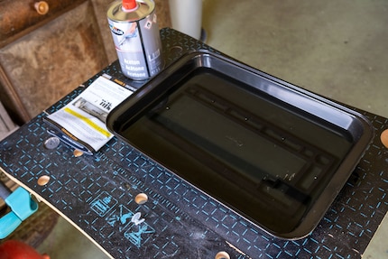 An acetone bath should remove all the grease residues  from your device.