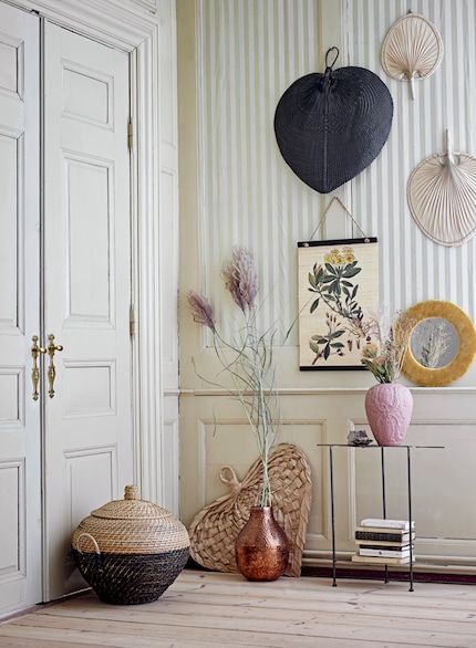 Leaf-shaped items are perfect for breaking up the rigid lines of rectangular rooms.