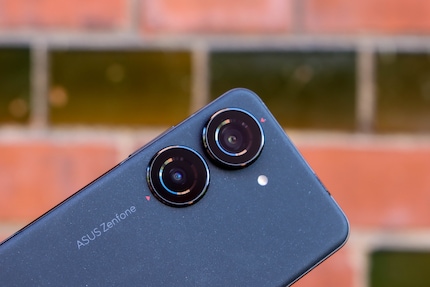 The cameras protrude from the housing, making it tilt on flat surfaces.