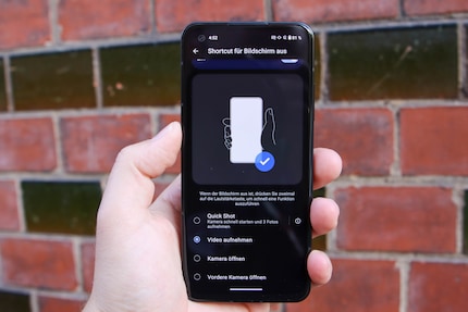 Quick Shot adds instant access to the camera.