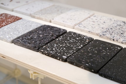The terrazzo-like material contains crushed shells of oysters, scallops and abalone. It can also be smoothed.