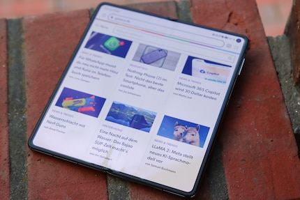 The crease in the middle doesn’t get in the way. I’m also happy to see more of my browser than on the narrow outdoor display.
