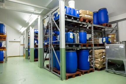 The herbs are stored in bags. he resulting liquid extracts are in the blue containers.