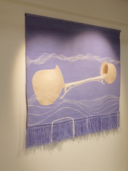La tapisserie a été réalisée selon une technique de tissage spéciale