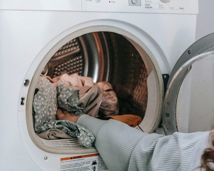 Throwing in a load of laundry is quick. Hanging up the clean clothing, however, takes longer than two minutes.