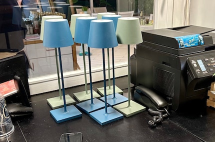 Freshly charged, these Poldina lamps are waiting to be used in a restaurant in Italy.