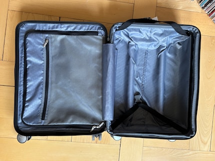 Two large compartments, a net, a zippered pocket and straps.