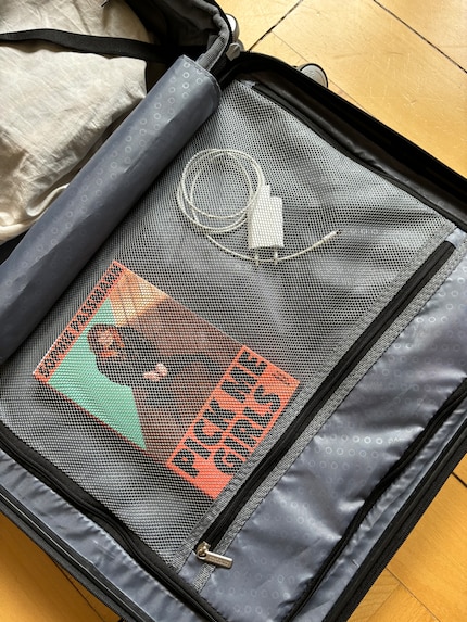 La poche en filet peut accueillir de petits objets.