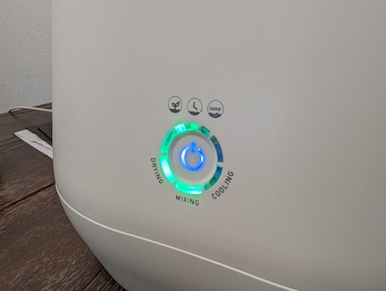 You select the three modes with a button on the front.