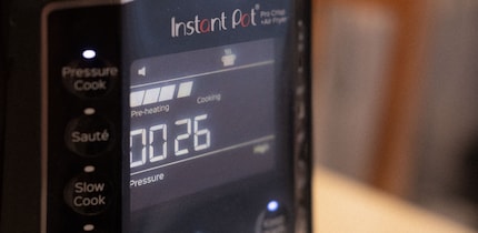 The preheating time is displayed on the left.