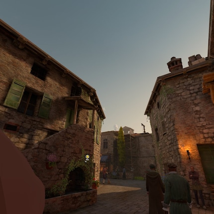 Monteriggioni : la petite ville a l'air vivante. A gauche de l'image, vous pouvez voir le bout du nez d'Ezio. 