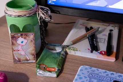 Keeping my desk and mind organised with a tiny bin and a notepad.