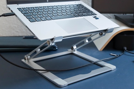 The stand makes sure both monitors are at the same height.