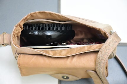Ma brosse entre même dans un tout petit sac à main.