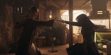 Jedi Master Indara (Carrie-Anne Moss) fights the presumably renegade Mae (Amandla Stenberg).