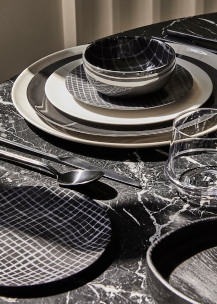 The two-tone grid emphasises the silhouette of these round ceramic objects.