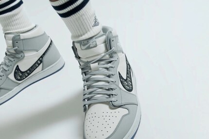 The Dior logo on the Nike logo.