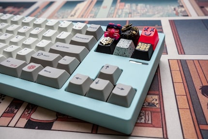 Artisan keycaps are in, «normal» navigation buttons are out.