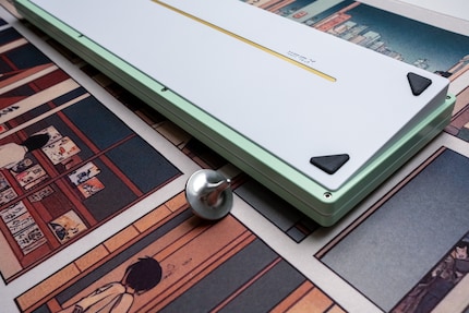 On the back of the Wind X, the internal brass weight is visible through a gap in the casing.