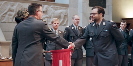 First Lieutenant Luka Popadić (right) is promoted to Captain.