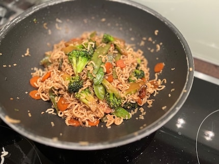 Quickly add a few vegetables to a wok or pan, mie noodles and soy sauce and your vegan dinner is ready.