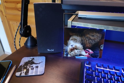 The cup coaster and picture of my cat have a permanent spot on my desk.