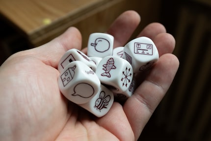 The symbols on the well-finished dice are all different.