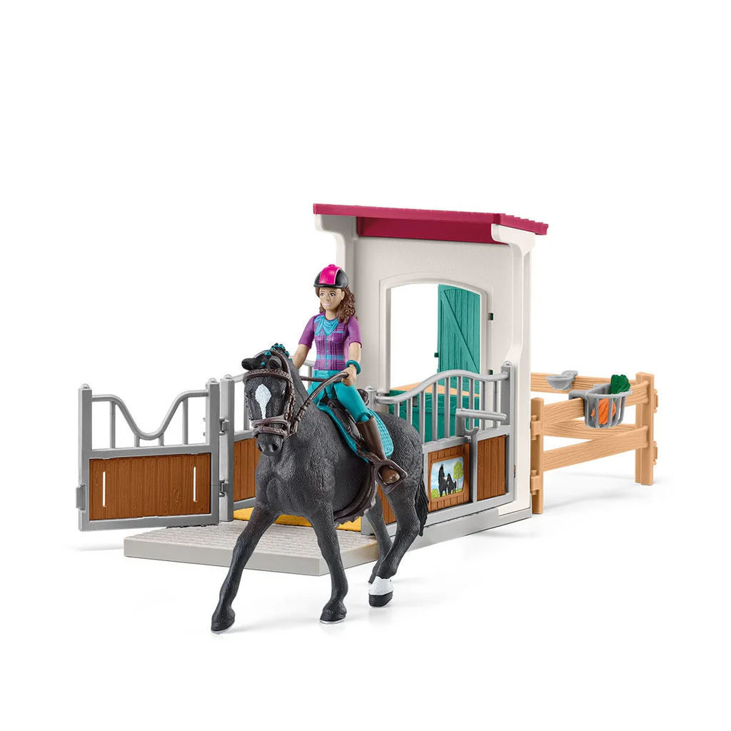 Le hongre hanovrien Storm et sa propriétaire Lisa dans le box des chevaux.