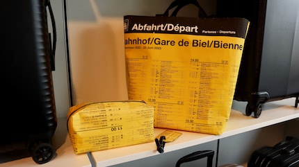 An upcycled bag made from discarded train posters that might appeal to train travellers.