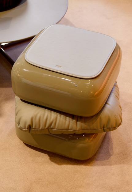 The Squash collection by Faye Toogood for Poltrona Frau, made of leather and lacquered wood.