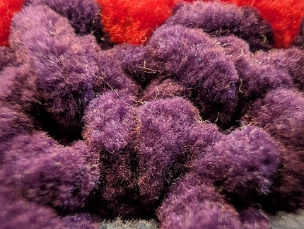 Macro shot of my crochet work. Every little strand of the wool is recognisable, even if the edges are blurred.