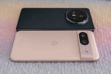 My Google Pixel 8 (front) is barely smaller and by no means thinner than the Magic V3.