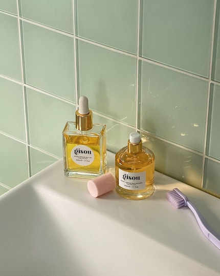 Hair oil on the left, hair perfume on the right.