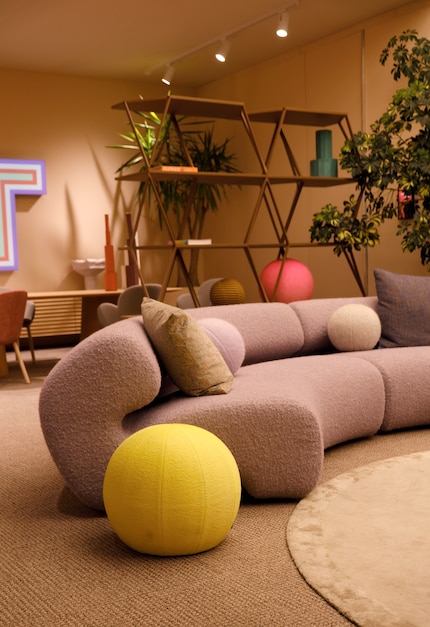 The curved design created by Italian brand Poltrona Frau lends the room a sleek aesthetic.