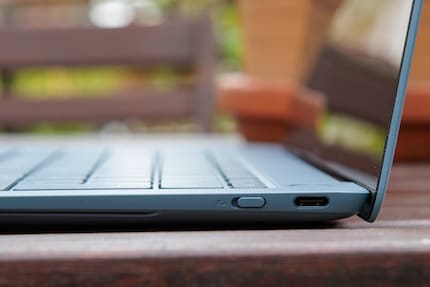 The button next to the USB-C port on the right turns the camera on and off.