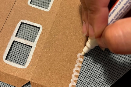 I draw the roof and murals on with a white Sharpie.