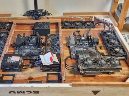 The NAS (left) contains numerous documents as well as photos and videos. To the right is the workstation
