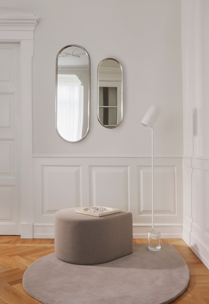 A mirror directly opposite a window or light fixture improves lighting.