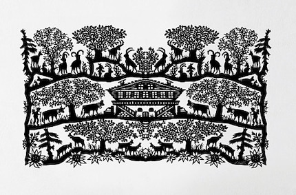 Le papier découpé traditionnel représente des motifs associés à la Suisse.