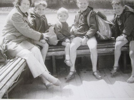Yves with his mother and brothers.