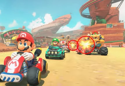 Deux bousculades : au premier plan, Peach et Bowser se battent, derrière, éventuellement, Donkey Kong et Daisy.